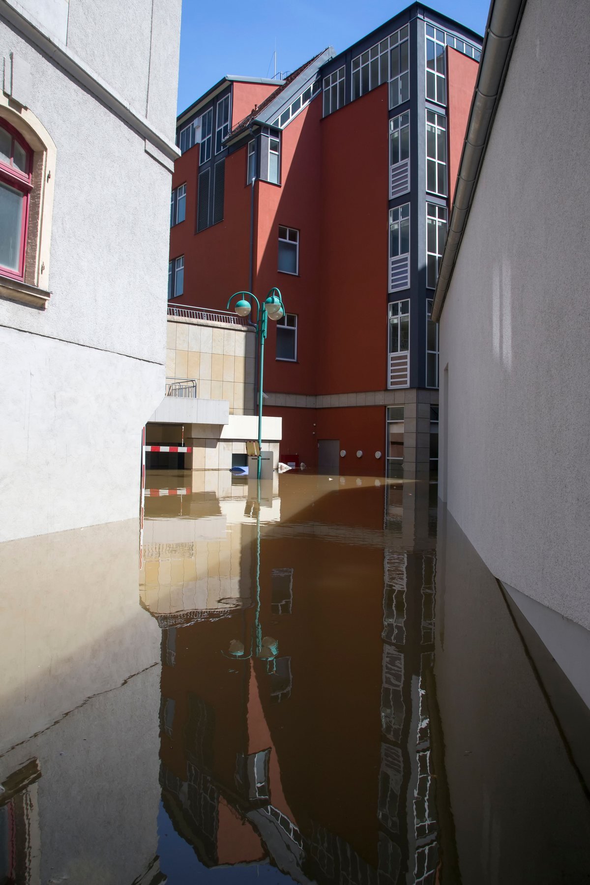 Standing flood water against a commercial building